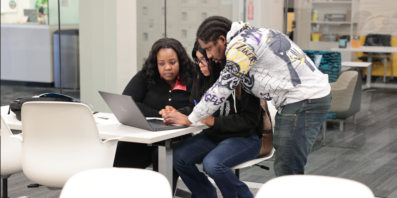 Student working together on a laptop