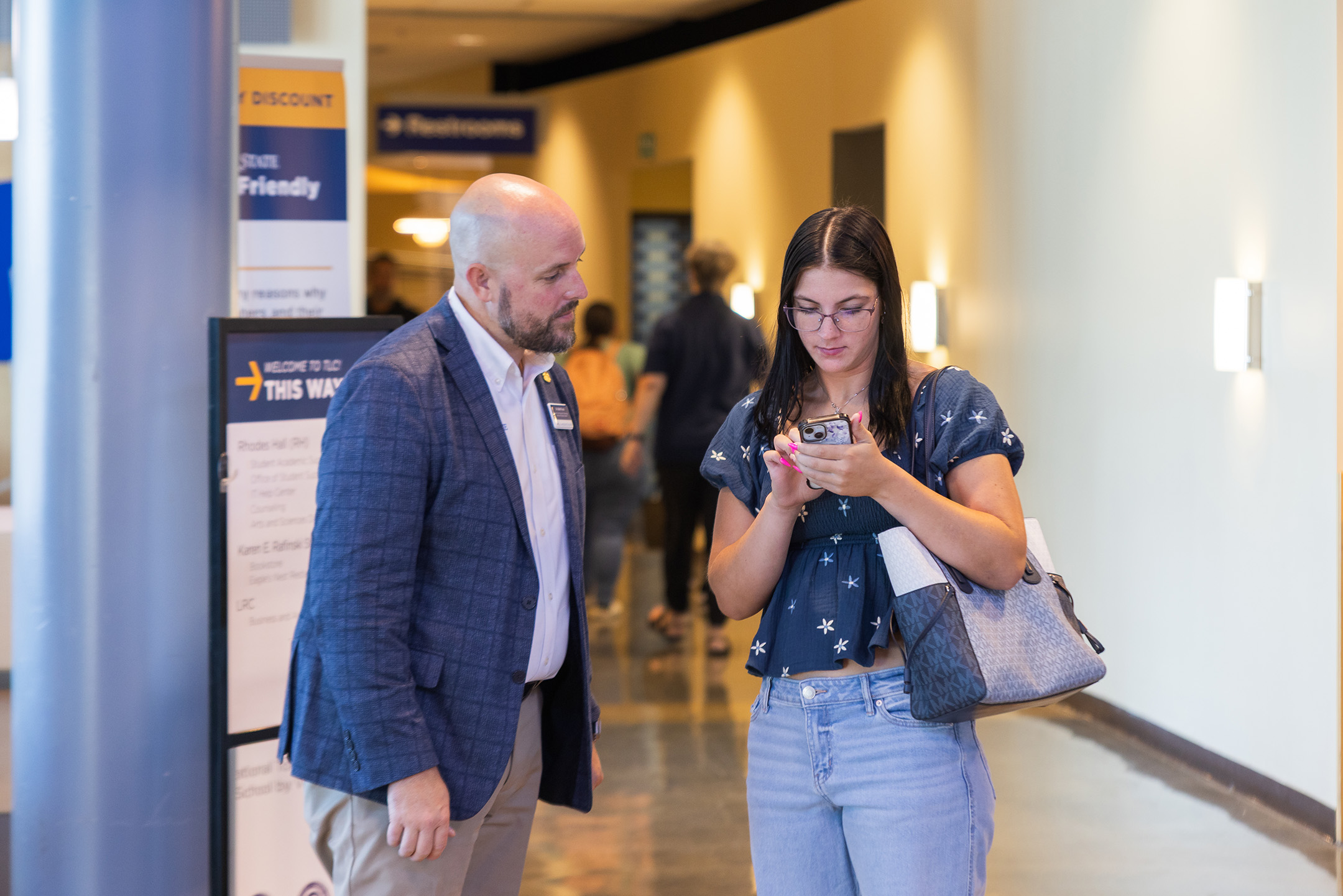 Student speaking with Clark State team member