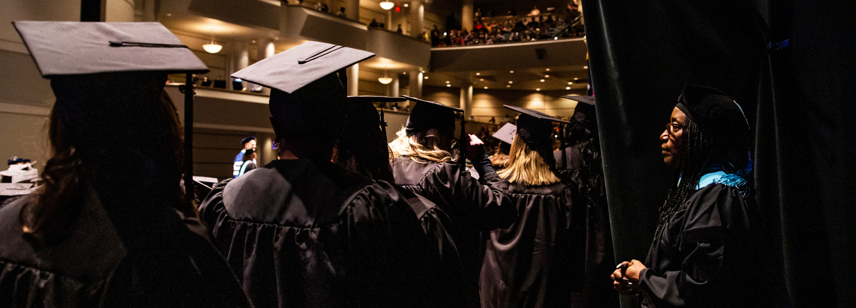 Graduation, Students in Caps and Gowns Lines Up