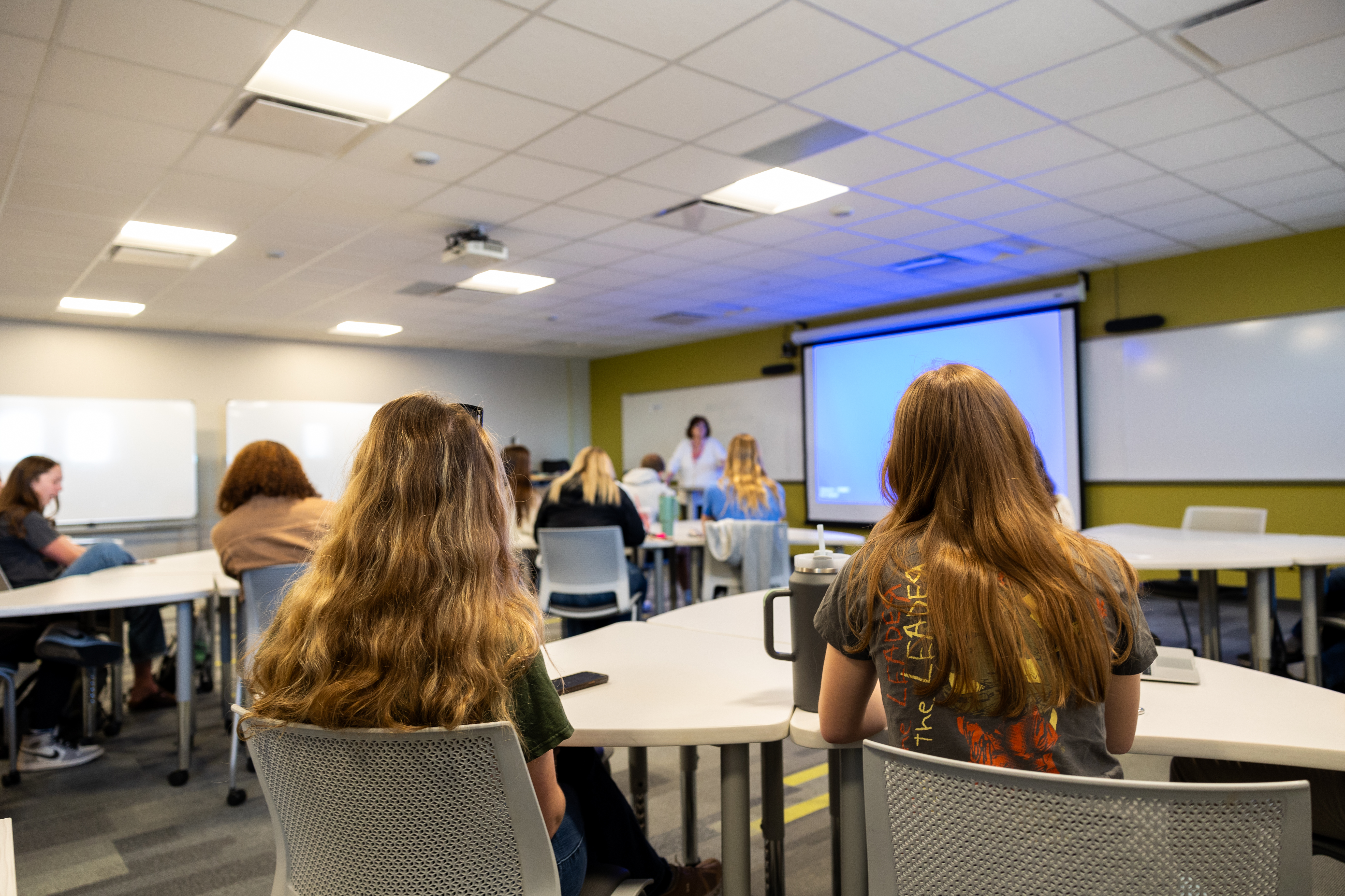 Students in classroom listening to instructor