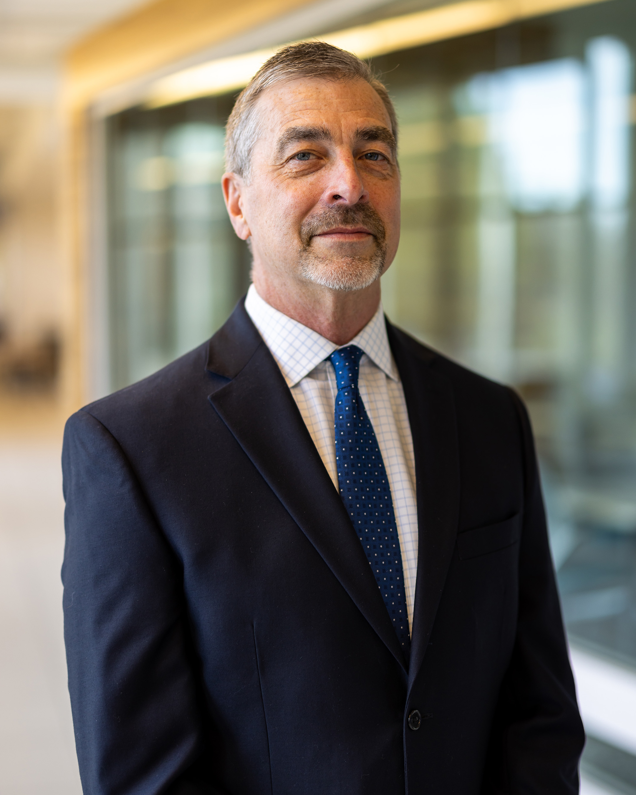 David Ball, a man wearing a black quite and white dress shirt.