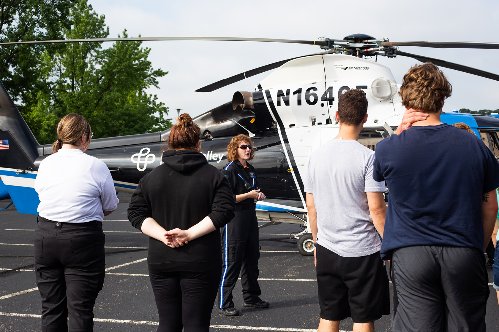 Students participating in a careflight helicopter training exercise.