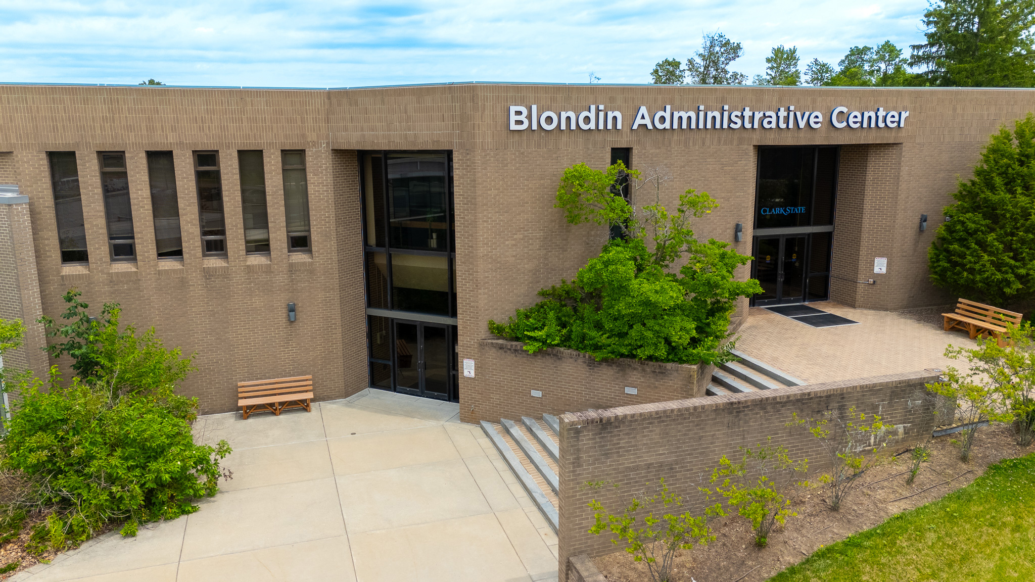Brick building with white letters