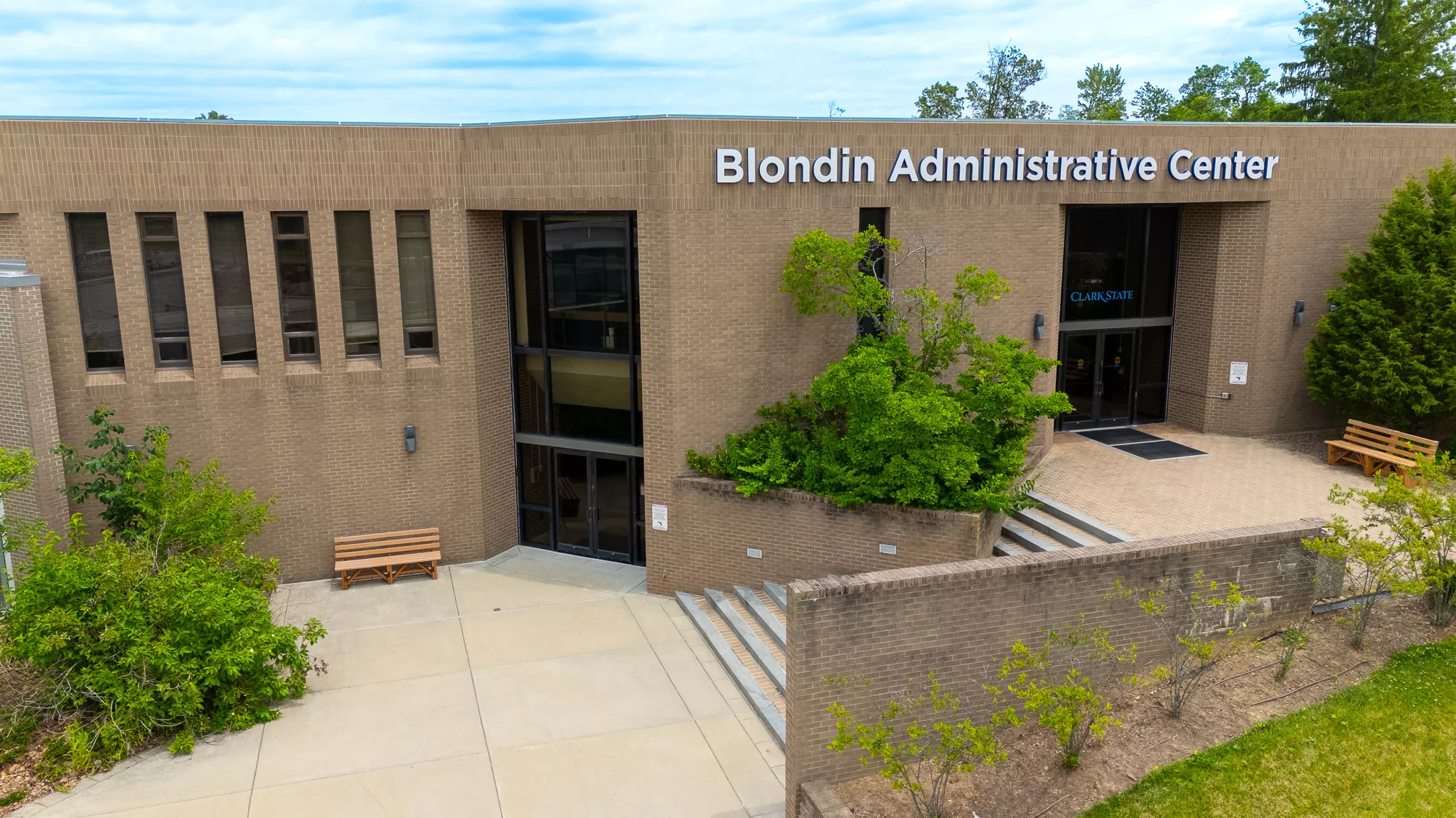 Brick building with white letters