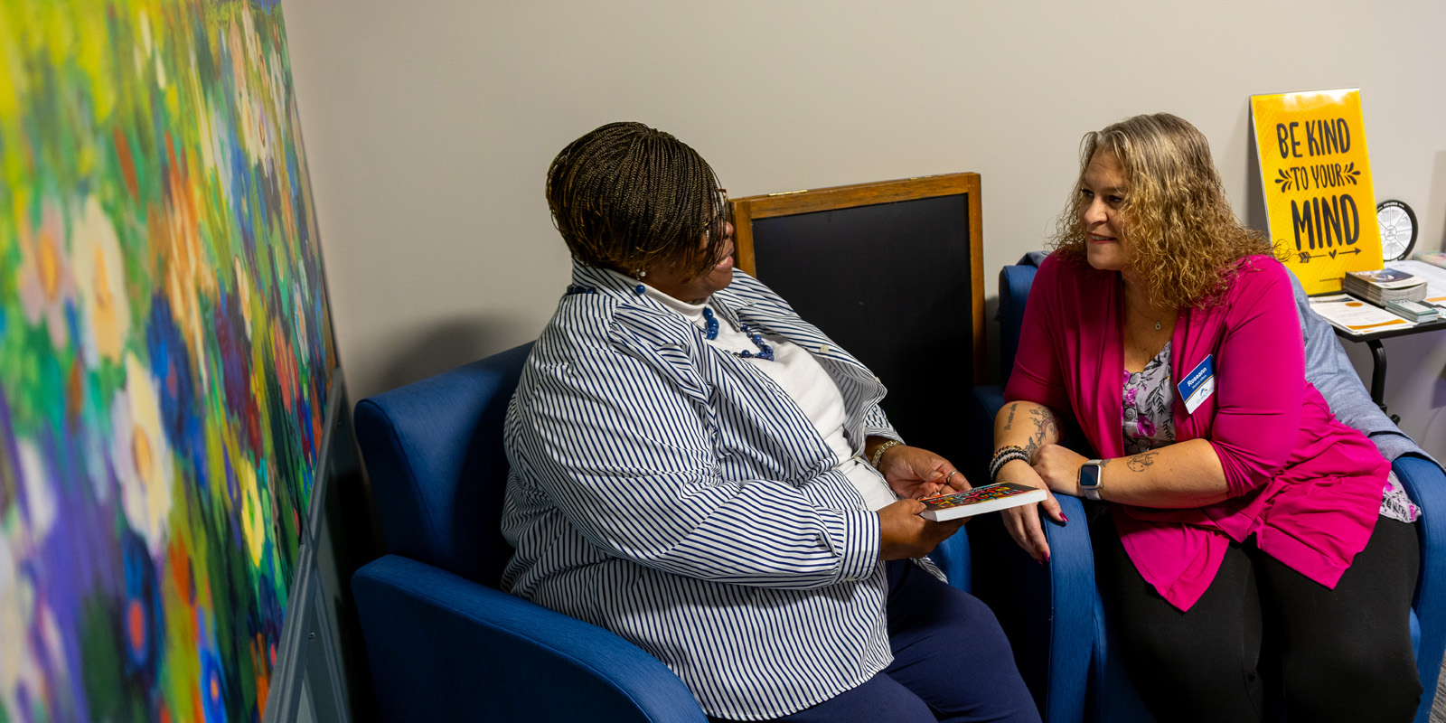 Student speaking with counselor