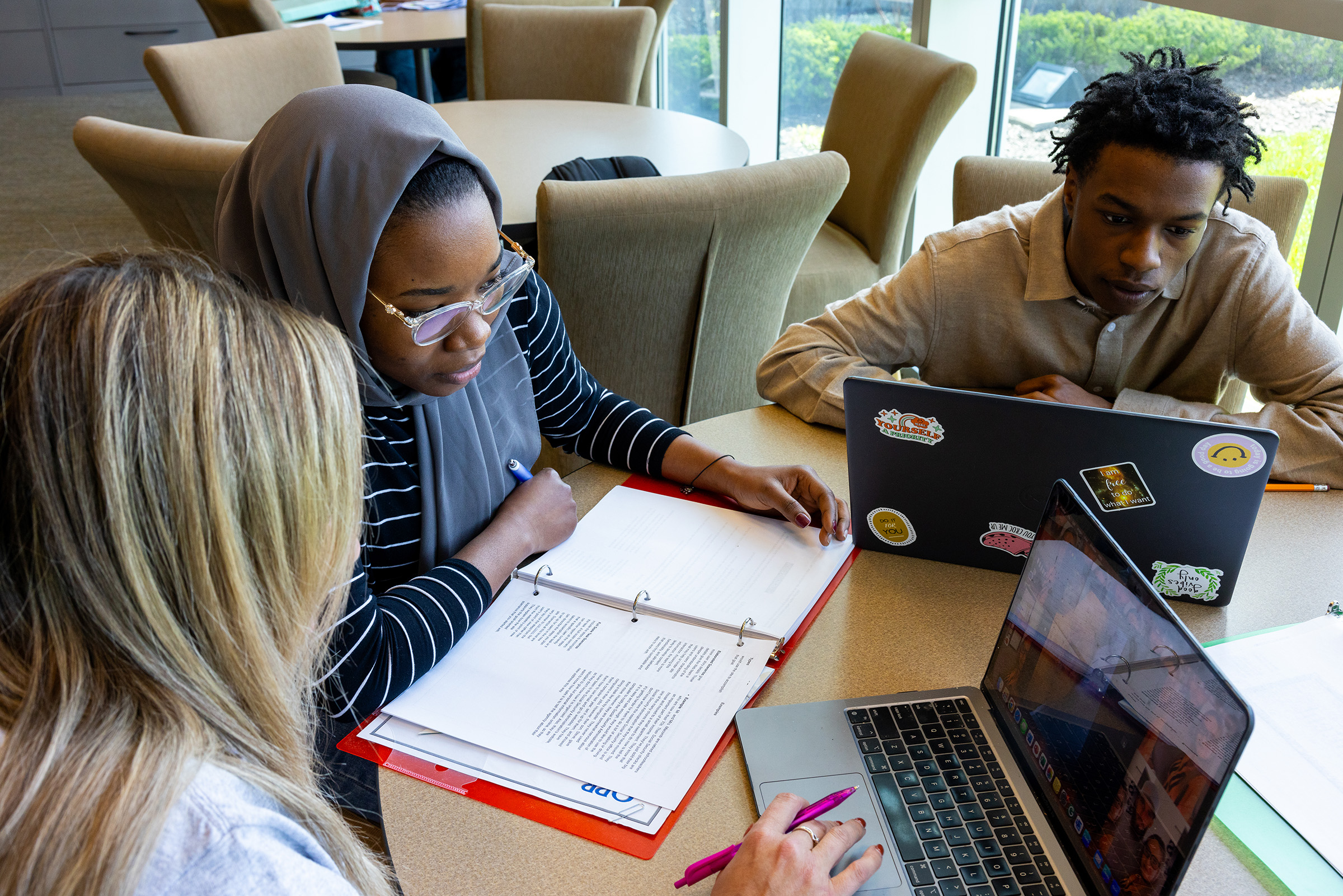 Students studying in library