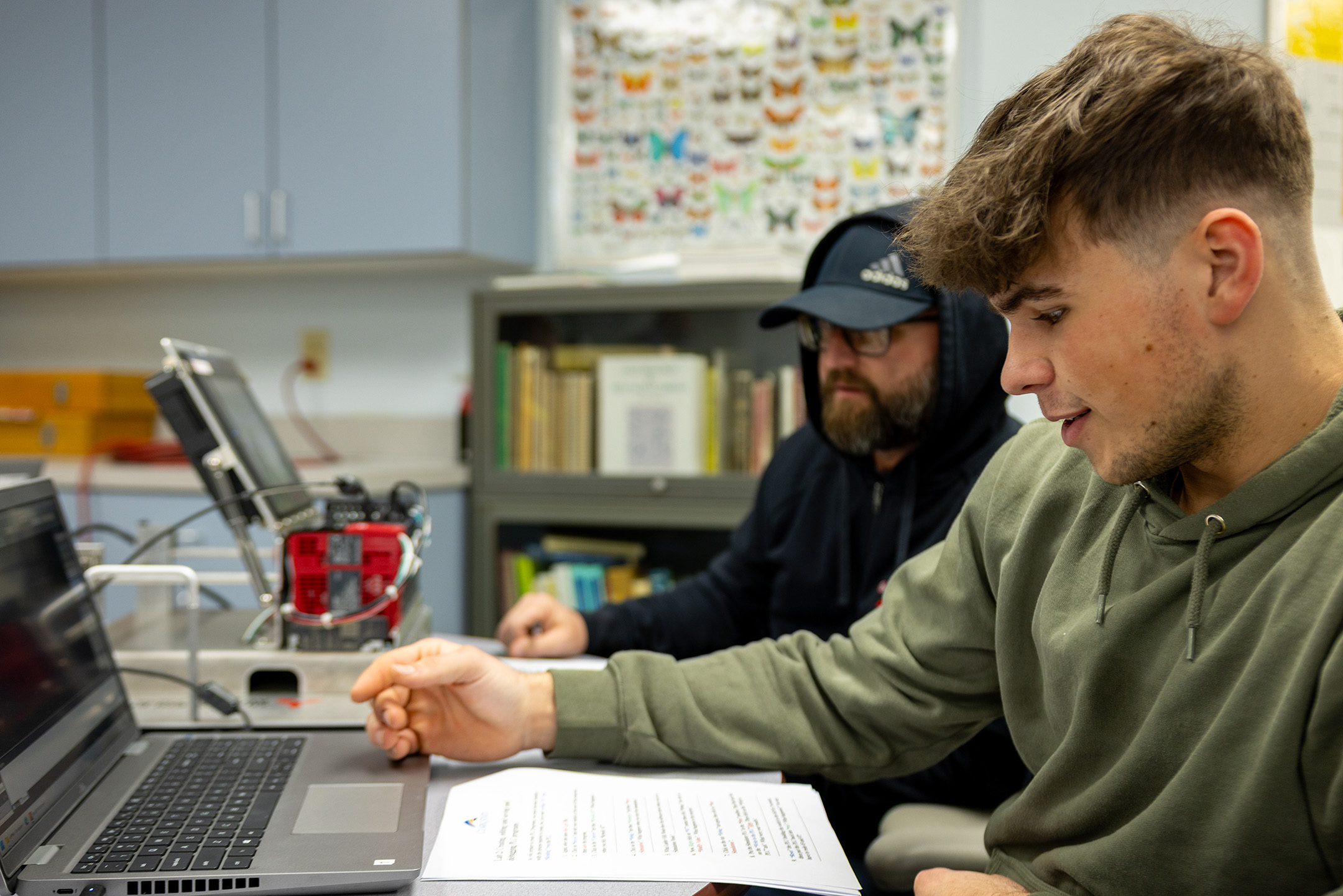 Student completing worksheet.