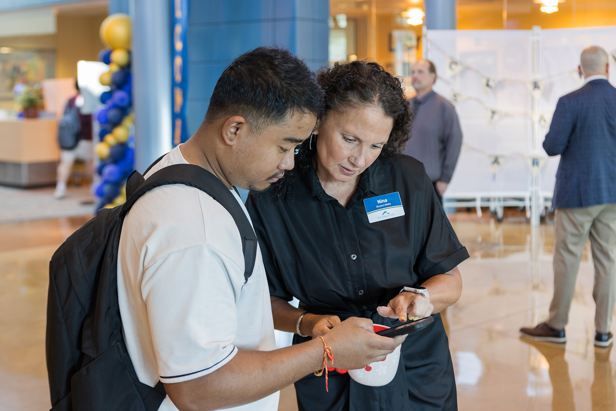 Student seeking help from Clark State team member