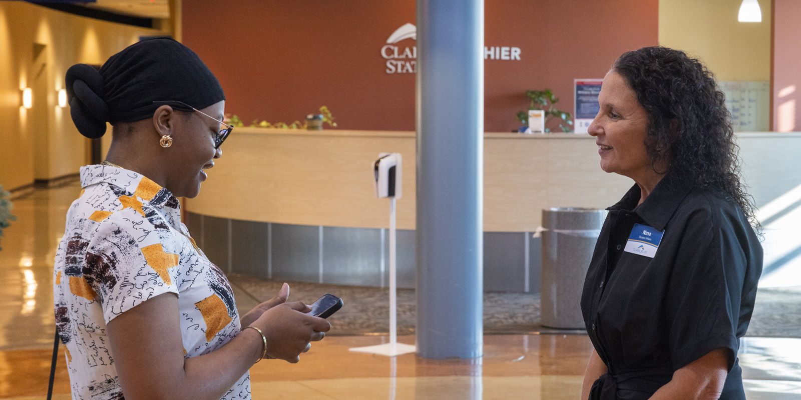 Student speaking with counselor