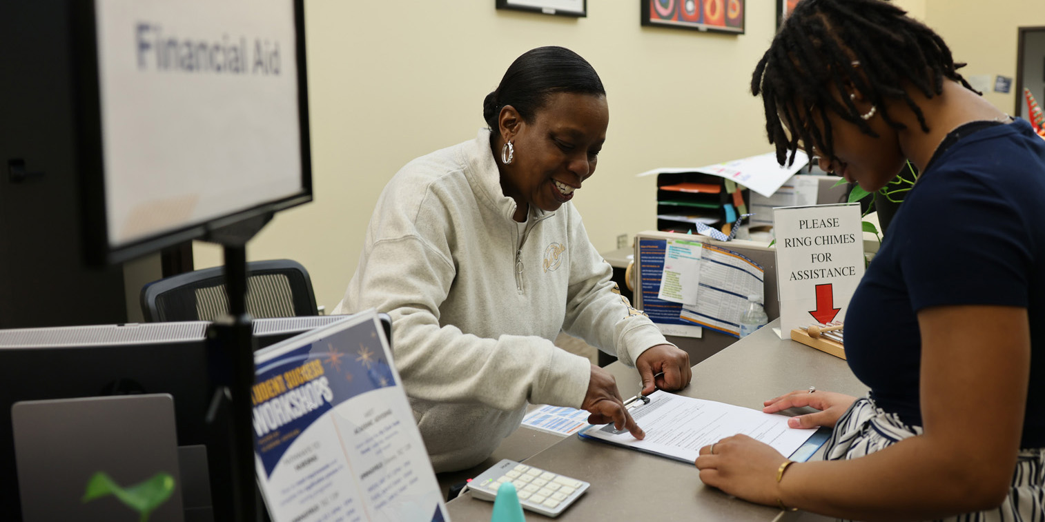 Student filling out paperwork